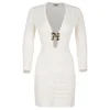 Knit dress with jewel flower