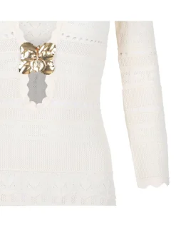 Knit dress with jewel flower